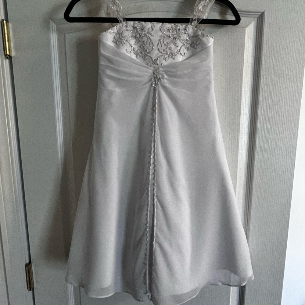 Flower girl dress. A few small stains that are hidden under chiffon overlay.